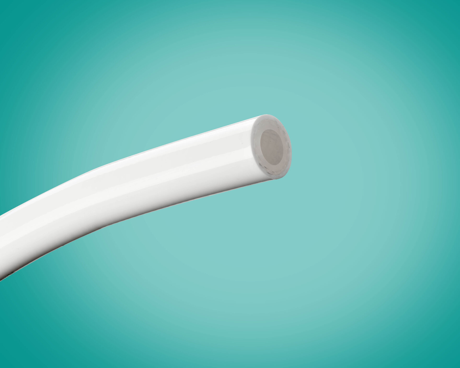 Image of a single piece of APSH-DB tubing on a teal background